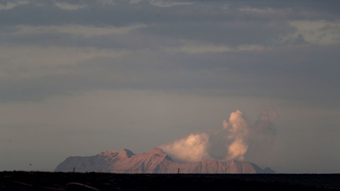 The eruption on White Island is viewed from the Bay of Plenty coastline on December 9.