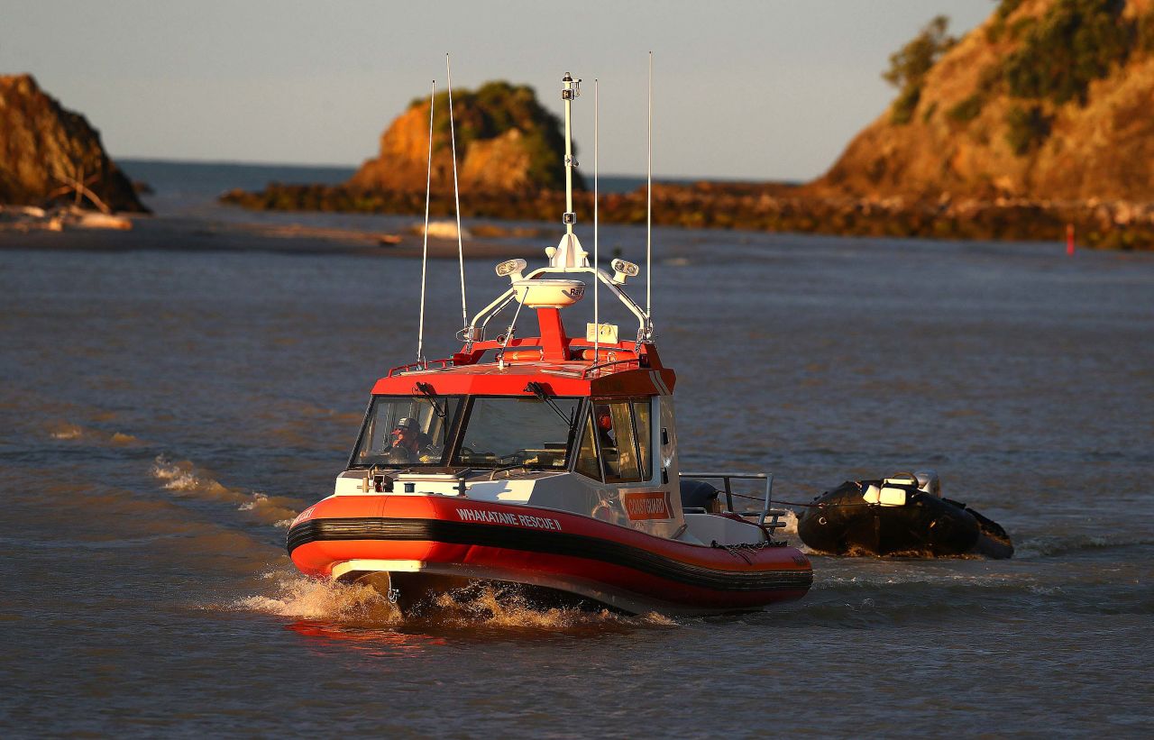 Coastguard rescue boats arrive at a marina near Whakatane on December 9.