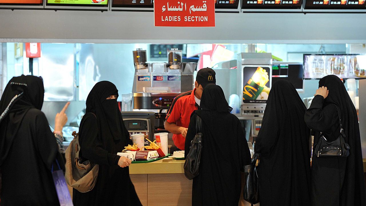Saudi women wait in line in the "Ladies Section" of a McDonald's in Riyadh in September 2011.