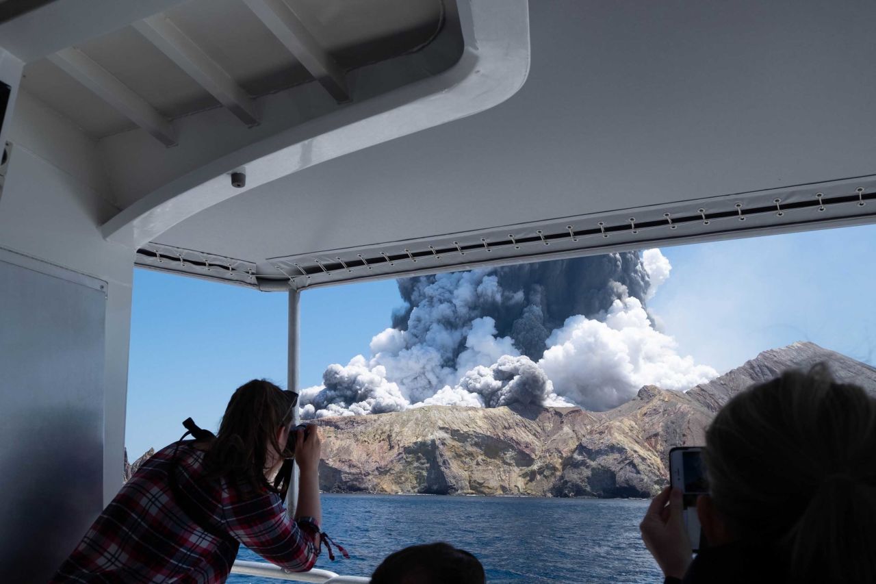 Michael Schade, a visitor to the island, captured this photo from a boat, moments after the eruption began.