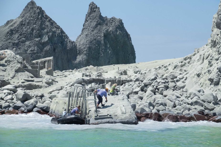 Tour operators prepare to evacuate visitors who were on the island during the eruption.