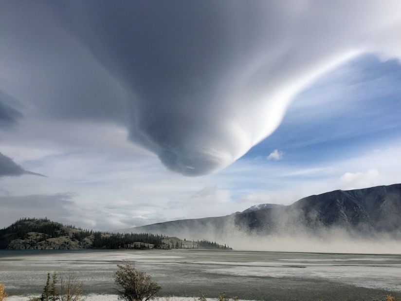 Most tornadoes start as funnel clouds, such as this large one in the Yukon, Canada. 