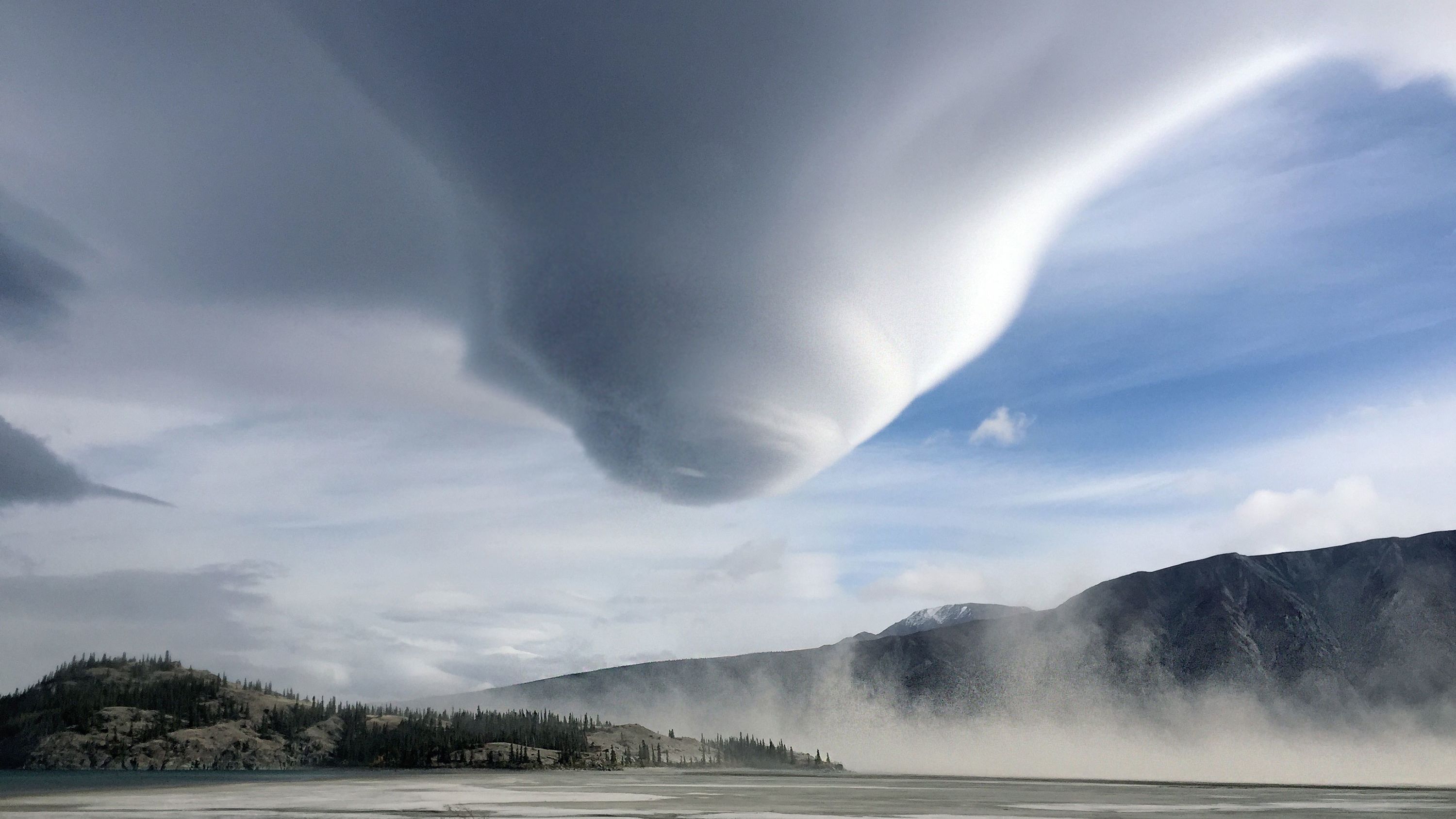 Lauren Marchant's "Twister in the Yukon" shows a large funnel cloud in the Yukon, Canada.
