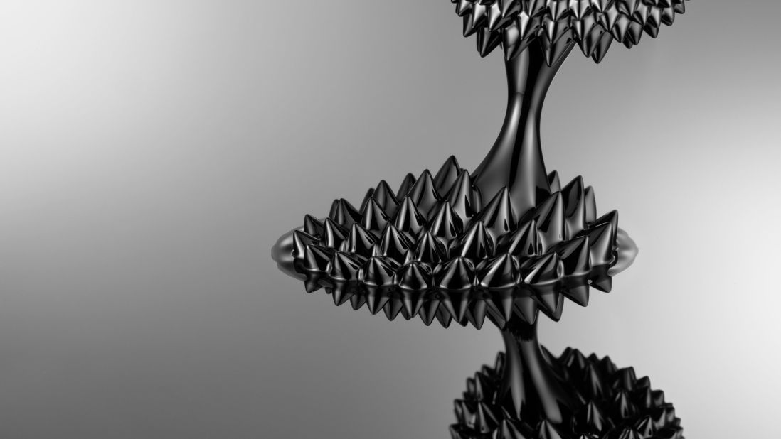 Ferrofluids shapeshift under the magnetic field created by two rare-earth disc magnets. 