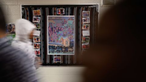 A bulletin board dedicated to Mario Aguilar hangs in the hallway at Wilbur Cross High School in New Haven, Connecticut. Since ICE detained Aguilar in September, students, teachers and administrators at the school have been pushing for his release.