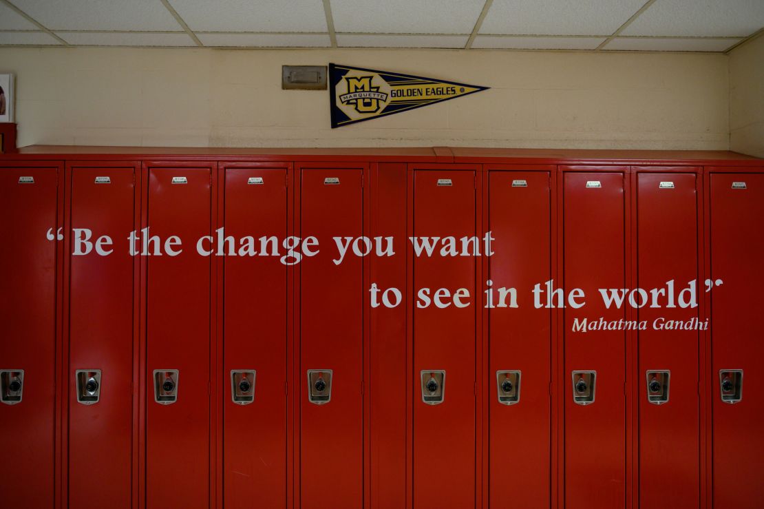 Photos and signs about Mario's case aren't the only calls to action on the walls at Wilbur Cross. A Mahatma Gandhi quote is painted on lockers on the third floor of the school.