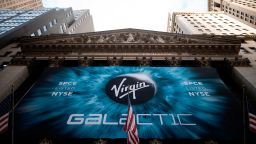 TOPSHOT - A logo of a Virgin Galactic is seen outside the building during the company's first day of trading on the New York Stock Exchange (NYSE) on October 28, 2019 in New York City. (Photo by Johannes EISELE / AFP) (Photo by JOHANNES EISELE/AFP via Getty Images)