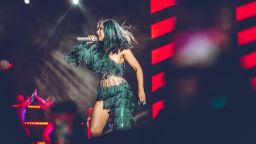 Dressed in the colors of the Nigerian flag, Cardi B performs at the Livespot X Festival in Lagos, Nigeria. Photo by Faje Kashope. 