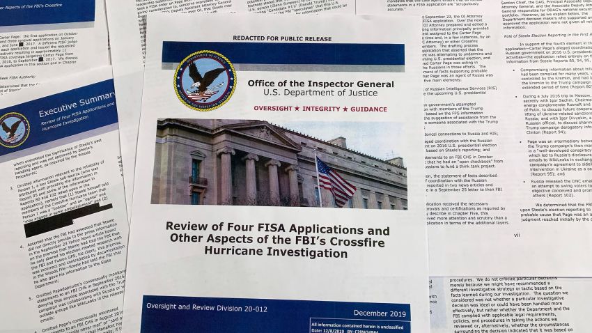 The report issued by the Department of Justice inspector general is photographed in Washington, Monday, Dec. 9, 2019. The report on the origins of the Russia probe found no evidence of political bias, despite performance failures.