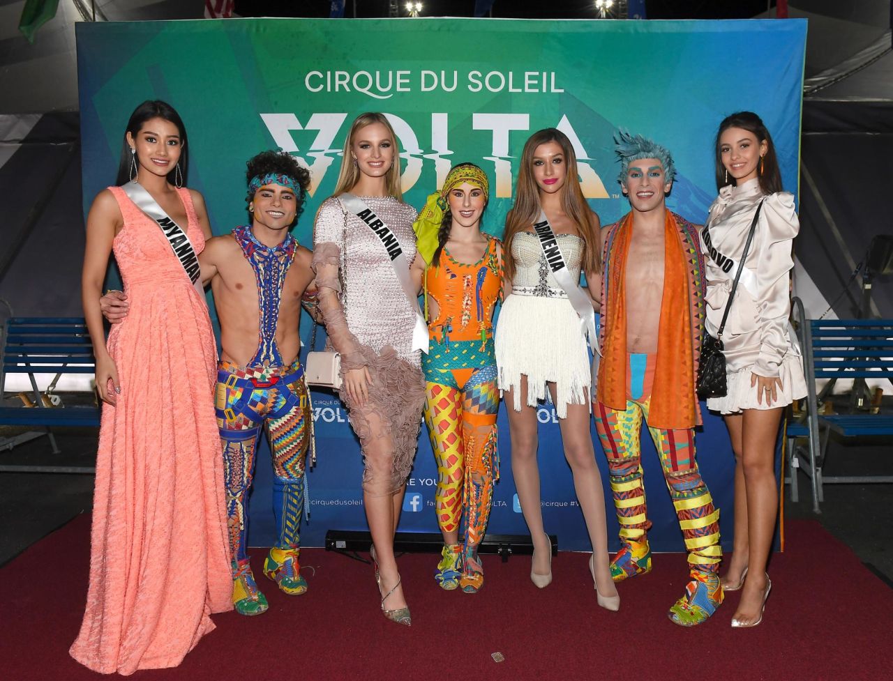 Miss Myanmar Swe Zin Htet, Miss Albania Cindy Marina, Miss Armenia Dayana Davtyan and Miss Kosovo Fatbardha Hoxha pose with cast members of Volta during Volta By Cirque Du Soleil at Atlantic Station on December 04, 2019 in Atlanta, Georgia. 