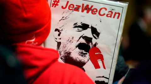 Supporters listen to Labour leader Jeremy Corbyn during a campaign event in Wales on December 08.