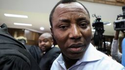 Convener of "#Revolution Now" Omoyele Sowore arrives at the courtroom during his arraignment for charges against the government at the Federal High Court in Abuja, on September 30, 2019. - Nigeria's high court ordered on September 30, 2019,  a former presidential candidate remanded in custody after he was charged with plotting treason over calls for a "revolution" in the West African nation. Omoyele Sowore, a fierce critic of President Muhammadu Buhari, has been held since August by the Department of State Services (DSS) secret police after urging protests under the online banner "#RevolutionNow". (Photo by KOLA SULAIMON / AFP)        (Photo credit should read KOLA SULAIMON/AFP via Getty Images)