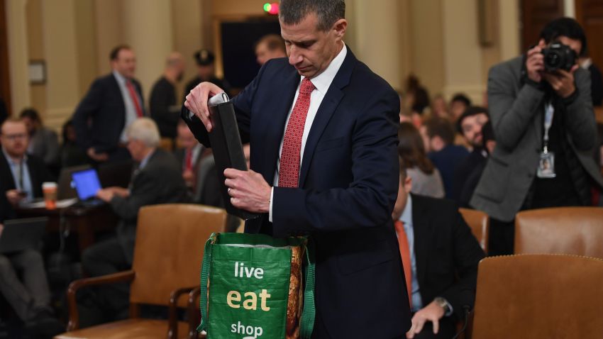 Stephen Castor, Minority Counsel for House Judiciary and House Permament Select Committee on Intelligence checks a bag on Capitol Hill in Washington,DC on December 9, 2019, during a House Judiciary Committee hearing on the grounds for the impeachment of President Donald Trump.