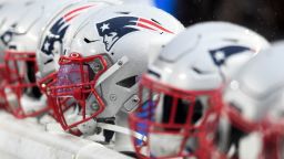 New England Patriots helmets on the sideline prior to a game against the Cleveland Browns on October 27, 2019 at Gillette Stadium in Foxborough, Massachusetts. New England won 27-13.