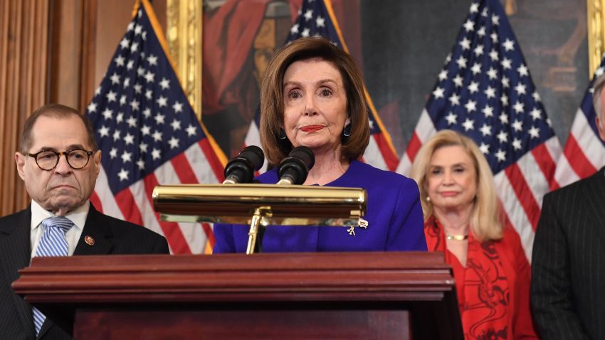 House Speaker Nancy Pelosi (D-CA) speaks next to House Judiciary Chairman Jerry Nadler(L), Democrat of New York, House Permanent Select Committee on Intelligence as they announce articles of impeachment for US President Donald Trump during a press conference at the US Capitol in Washington, DC, December 10, 2019.