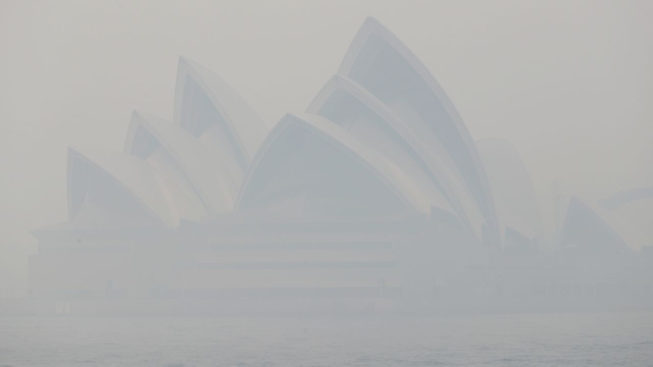 Thick smoke shrouds the Opera House in Sydney on Tuesday.