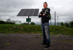 Dale Vince, Chairman of Forest Green Rovers poses next to a solar panel at the New Lawn. The Stadium is completely fulled by renewable energy.