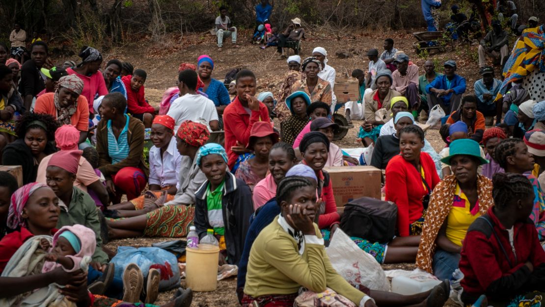 A crowd waits for food aid distribution to begin in Kasibo, Zimbabwe.