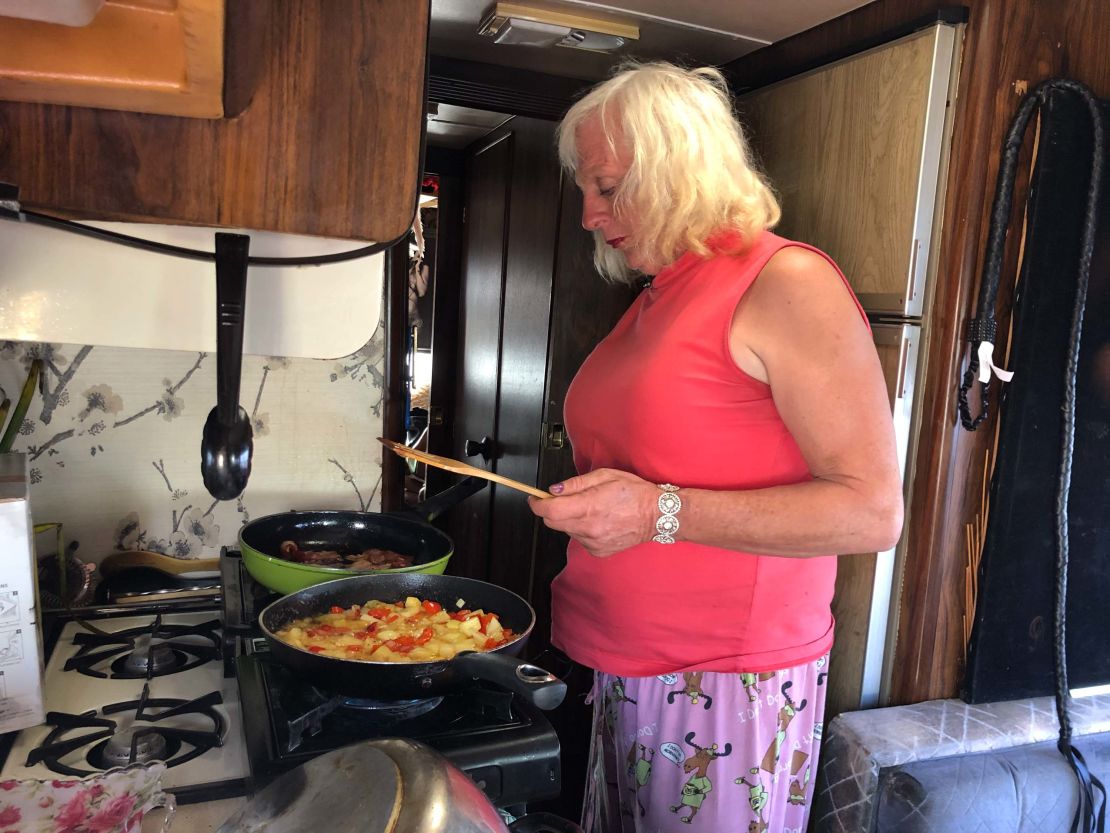 Megan Sue Belafonte prepares breakfast in an RV.