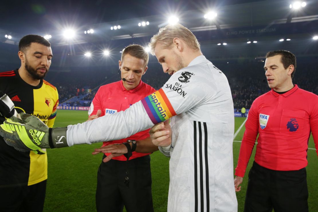 Leicester City's goalkeeper Kasper Schmeichel wears a rainbow themed captain's armband. 