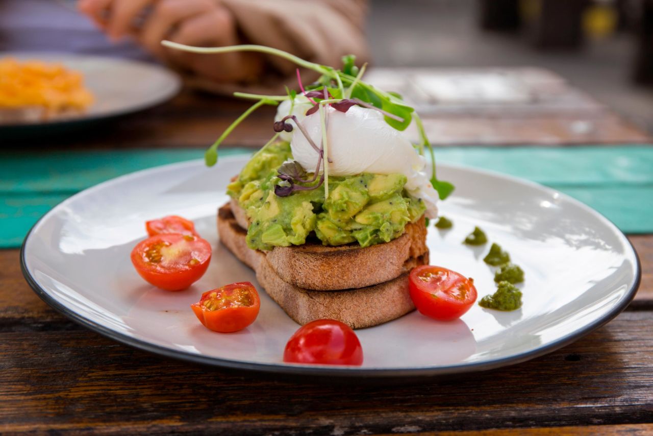 <strong>Avocado toast with poached eggs: </strong>This Australian standard breakfast is a mighty fine hangover option in Sydney.