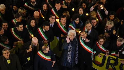 Liliana Segre, an 89-year-old Auschwitz survivor, center, with Milan's mayor Giuseppe Sala during an anti-racism demonstration in northern Italy.