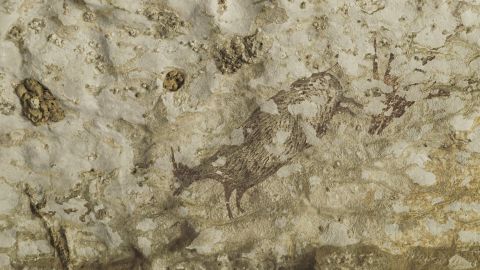 Part of the scene depicted in the world's oldest cave art, which shows half-animal, half-human hybrids hunting pigs and buffalo. 