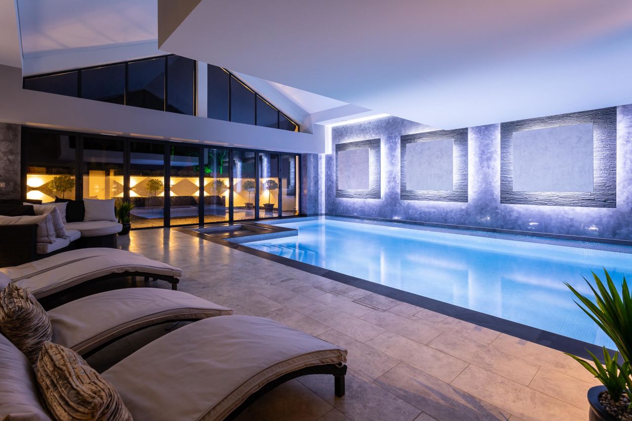 The $5 million luxury mansion boasts an indoor pool, spa and gym.