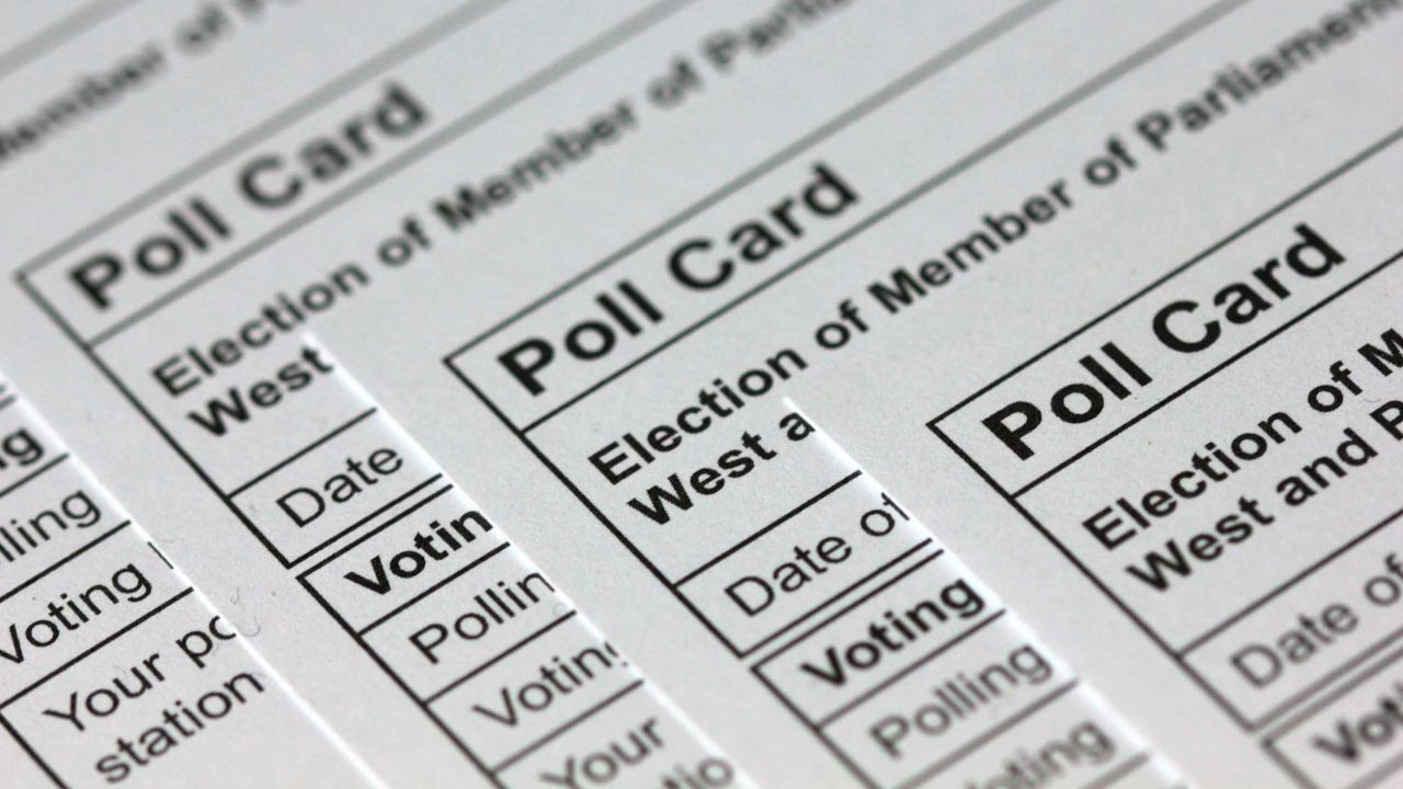 A photograph taken in London on November 14, 2019 shows polling cards for the 2019 UK general election arranged as an illustration. (Photo by Daniel SORABJI / AFP) (Photo by DANIEL SORABJI/AFP via Getty Images)