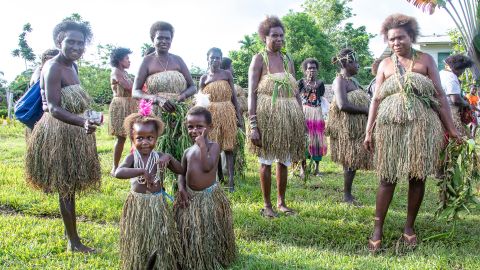 Women and children wear traditional dress at a referendum polling station in Buka, Bougainville, on November 25, 2019.