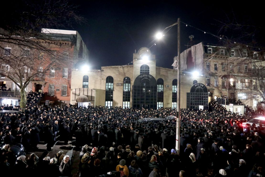 Thousands of Orthodox Jewish men crowded Rodney Street in Williamsburg, Brooklyn.