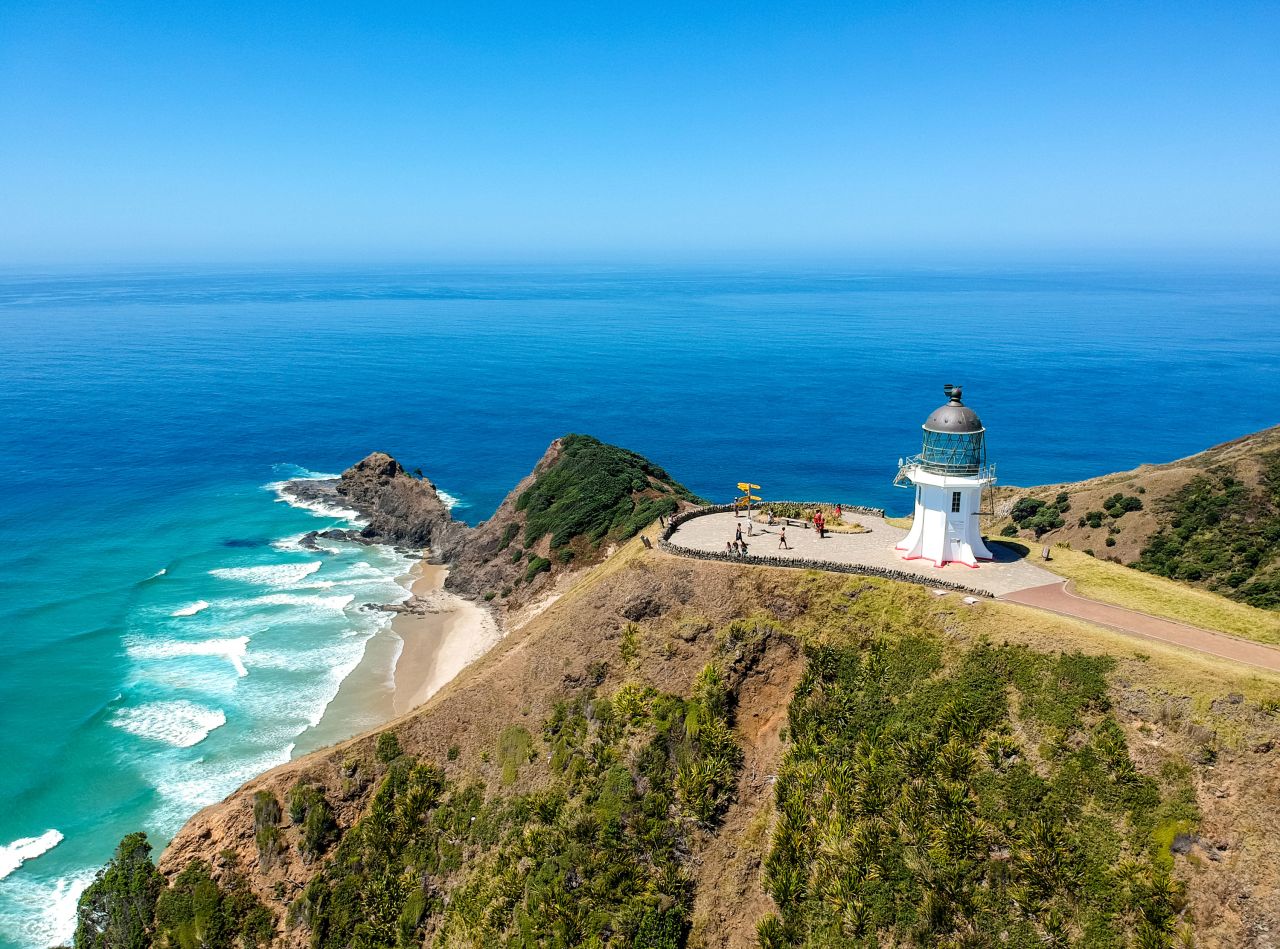 <strong>Cape Reinga: </strong>You can see where the Tasman Sea (between New Zealand and Australia) and the Pacific Ocean meet at Cape Reinga Lighthouse, the northernmost point open to the public of the North Island.