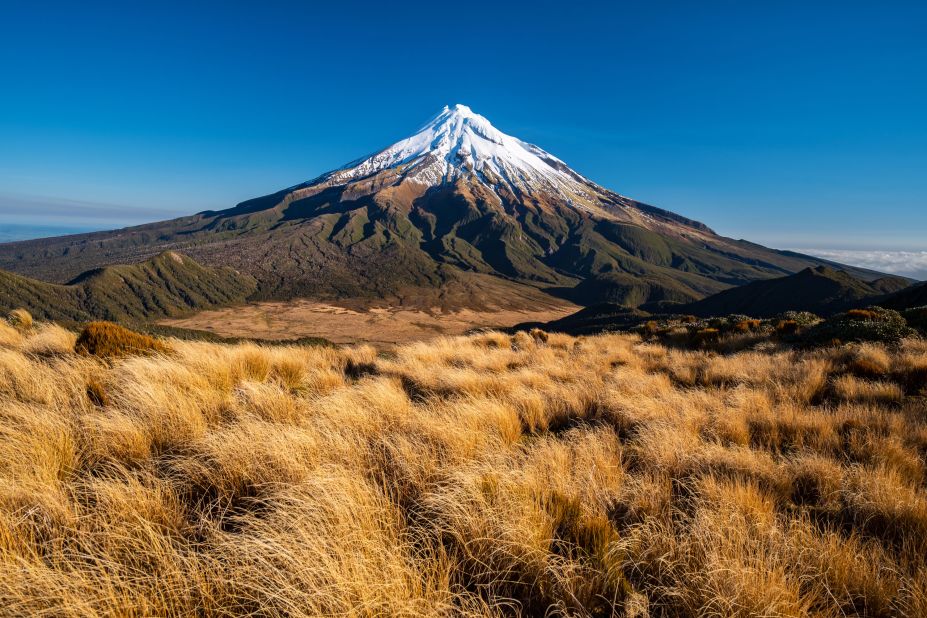 <strong>Taranaki: </strong>The perfectly symmetrical Mt Taranaki (a double for Japan's Mt Fuji), is the optimum vantage point to take in the region's lush, rolling countryside and black-sand coastline.