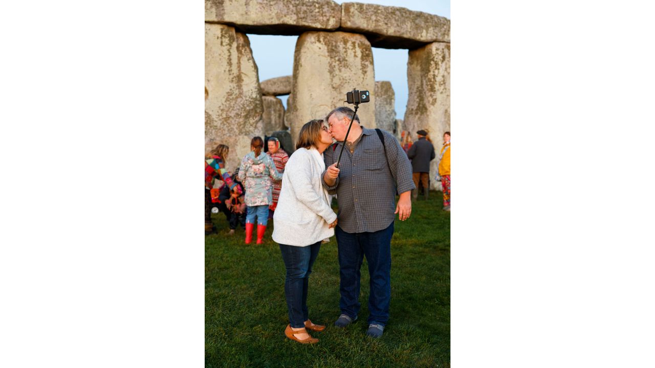 Martin Parr, who took this image during the autumn equinox, is now looking to identify the couple in the photograph.