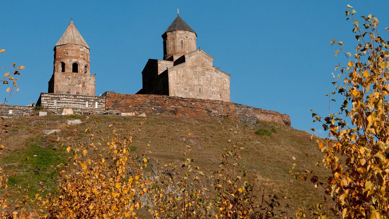 Gergeti Trinity Church is set against the dramatic backdrop of Mount Kazbek, Europe's fifth-highest summit.