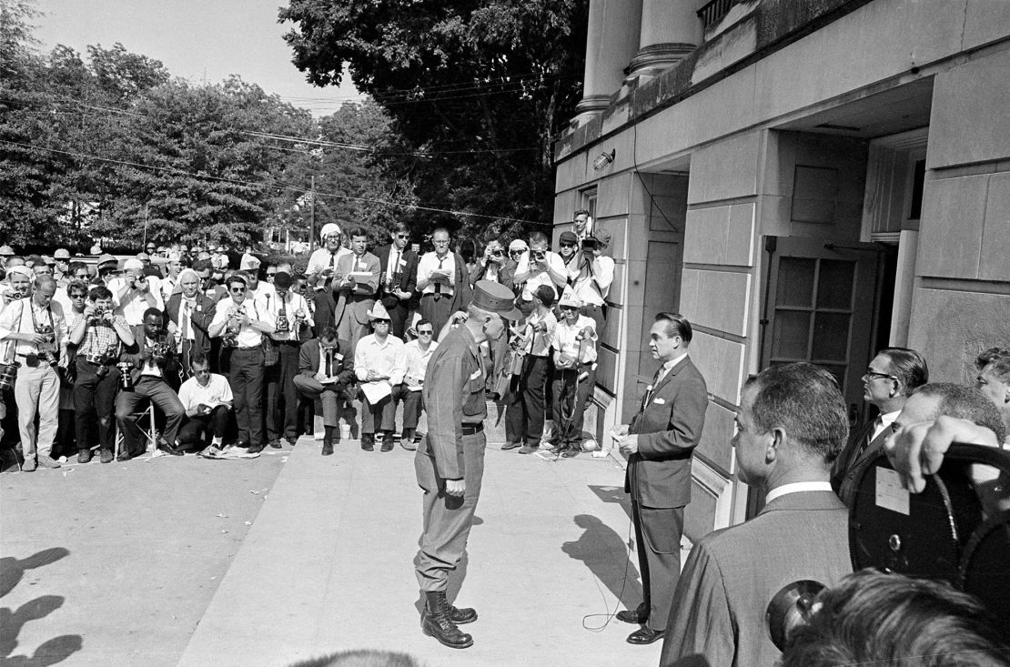 Alabama Gov. George C. Wallace confronts National Guard Brig. Gen. Henry Graham at the University of Alabama in Tuscaloosa June 11, 1963, in a symbolic effort to block integration of the school.