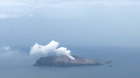 White smoke can still be seen billowing from the White Island volcano on December 12.