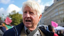 Stanley Johnson, father of Britain's Prime Minister Boris Johnson, arrives to address activists from a stage at Trafalgar Square, during the third day of climate change demonstrations by the Extinction Rebellion group in central London, on October 9, 2019. - Demonstrations occurred in 60 cities around the world this week, with thousands taking to the streets of New Delhi, Cape Town, Paris, Vienna, Madrid, and Buenos Aires. Extinction Rebellion is demanding that governments drastically cut carbon emissions. (Photo by ISABEL INFANTES / AFP) (Photo by ISABEL INFANTES/AFP via Getty Images)