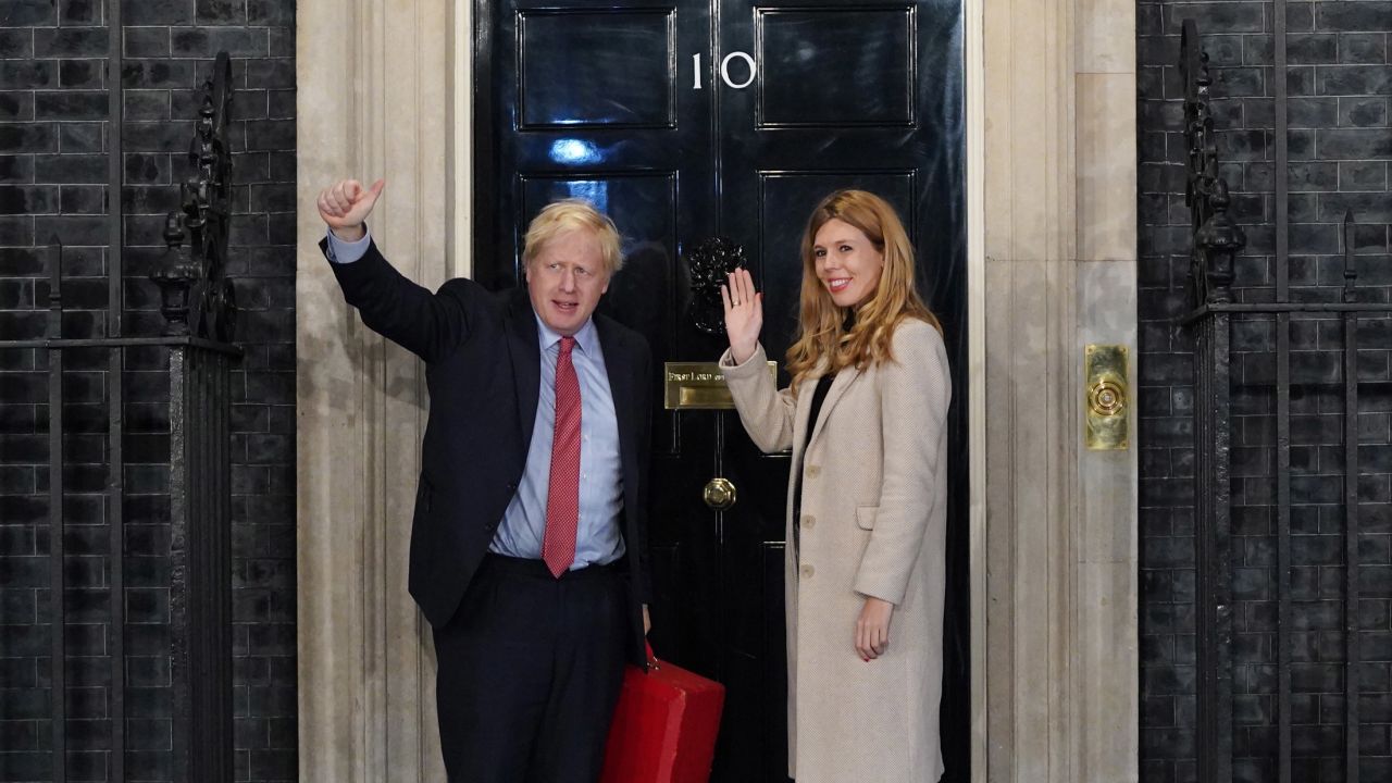 Prime Minister Boris Johnson and his partner Carrie enter Downing Street as the Conservatives celebrate a sweeping election victory on December 13, 2019 in London, England.