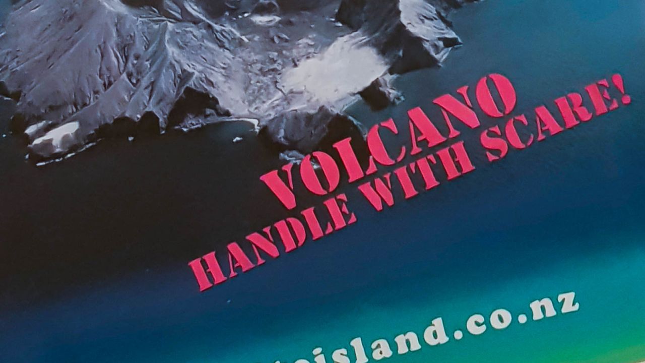 "Handle with scare" -- a brochure used to promote tours of White Island. 