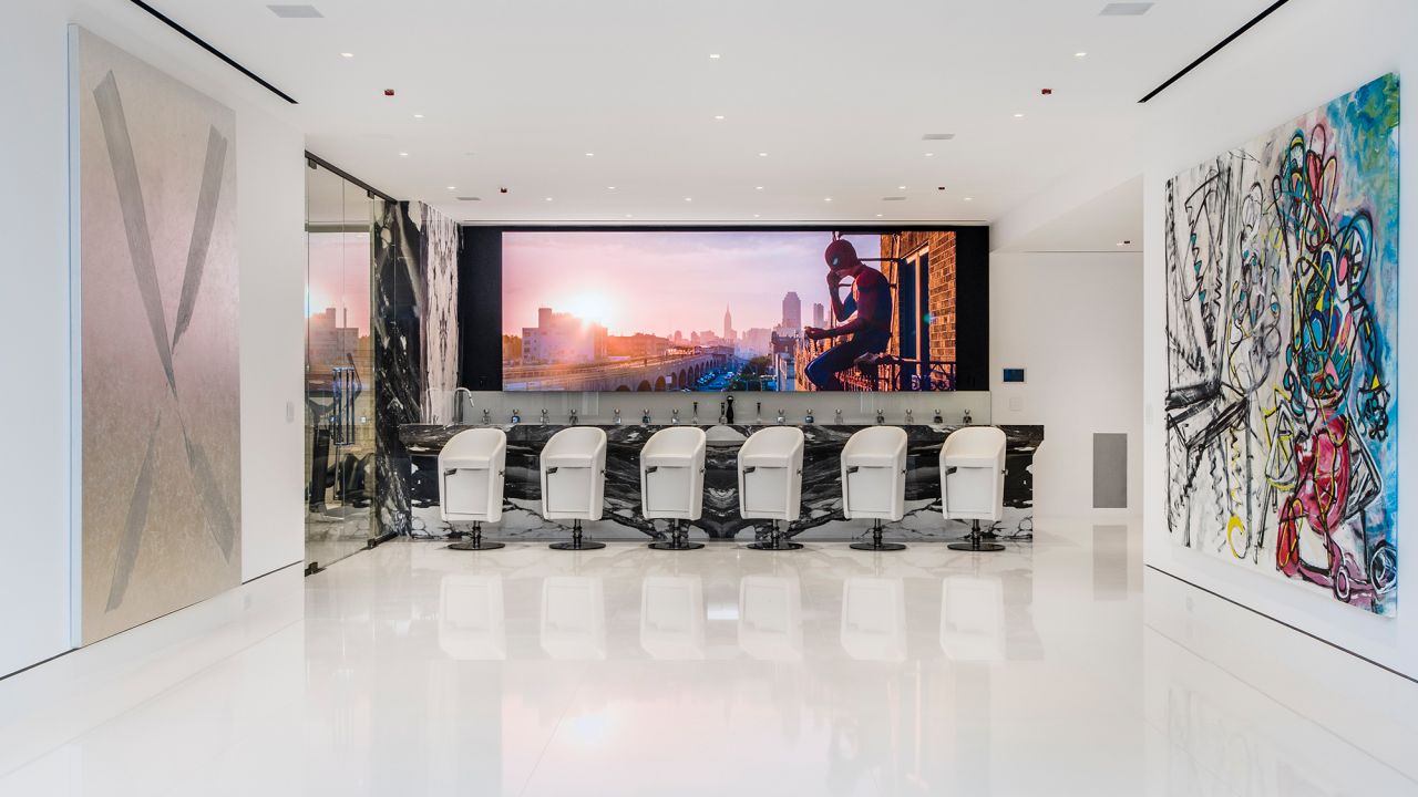 The lounge, just off the car gallery, is a socalizing space with a view of the cars.