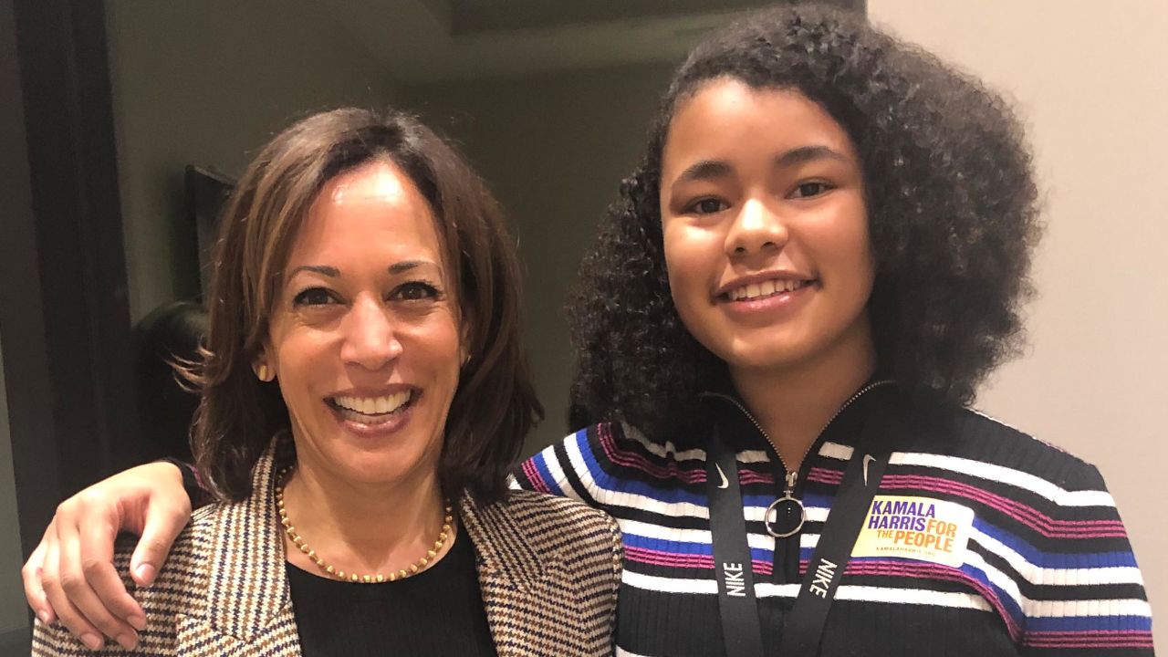 Sen. Kamala Harris poses with Paris Bond, class president of her Iowa middle school, at a private supporter meeting in November.