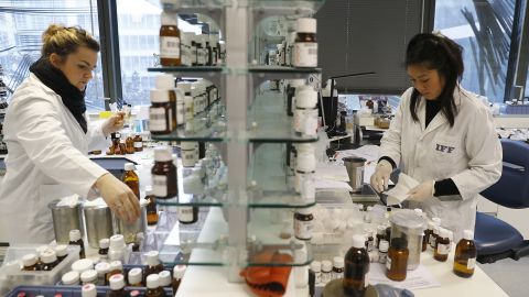 IFF employees working with perfume components at a company lab in France in 2016.