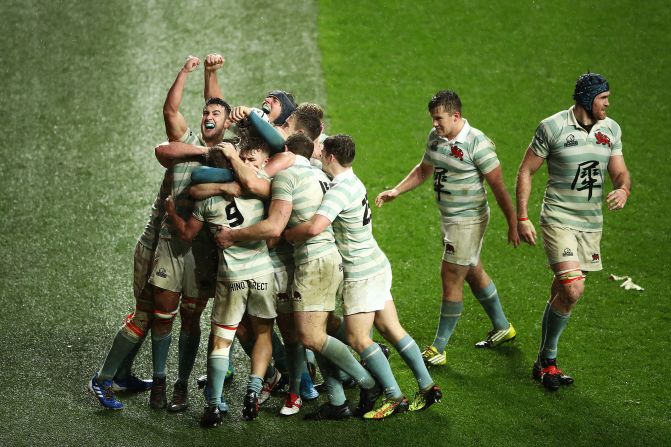 Cambridge celebrates scoring their third try during the 138th Varsity Game against Oxford at Twickenham Stadium on Thursday, December 12 in London. <br />