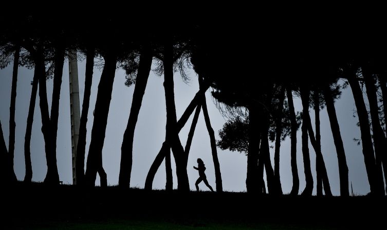 A runner warms up ahead of the European Cross Country Championships in Lisbon, Portugal, on Sunday, December 8.