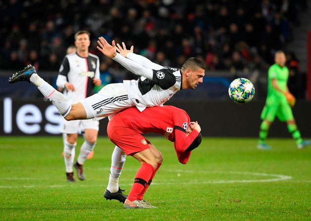 Juventus' Merih Demiral and Leverkusen's Kai Havertz compete for the ball during the UEFA Champions League Group D football match on Wednesday, December 11, 2019, in Leverkusen, Germany.