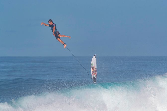 A surfer wipes out in the free zone next to the Pipeline Masters at the North Shore of Oahu in Hawaii on Tuesday, December 10.