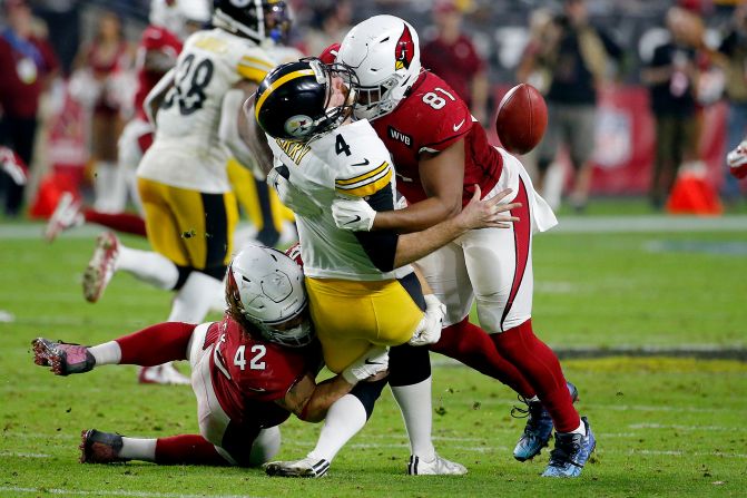 Arizona Cardinals tight end Darrell Daniels and linebacker Dennis Gardeck hit Pittsburgh Steelers' Jordan Berry during a fake punt attempt on Sunday, December 8, in Glendale, Arizona. The Steelers beat the Cardinals 23-17.