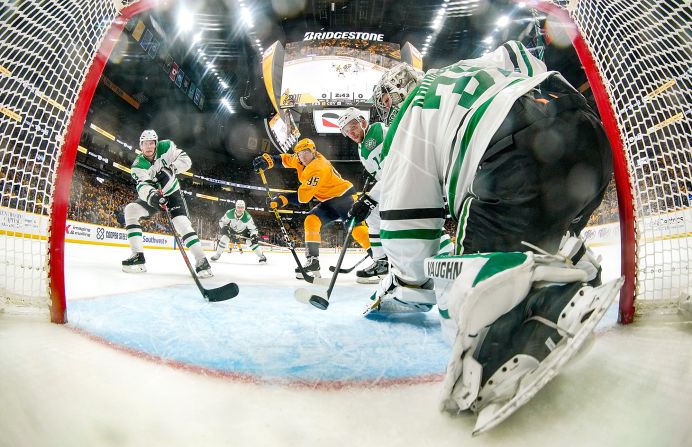 Anton Khudobin of the Dallas Stars makes a save against Matt Duchene of the Nashville Predators on Saturday, December 14, in Nashville.
