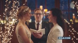 A scene from a recent Zola commercial shows a lesbian couple getting married.